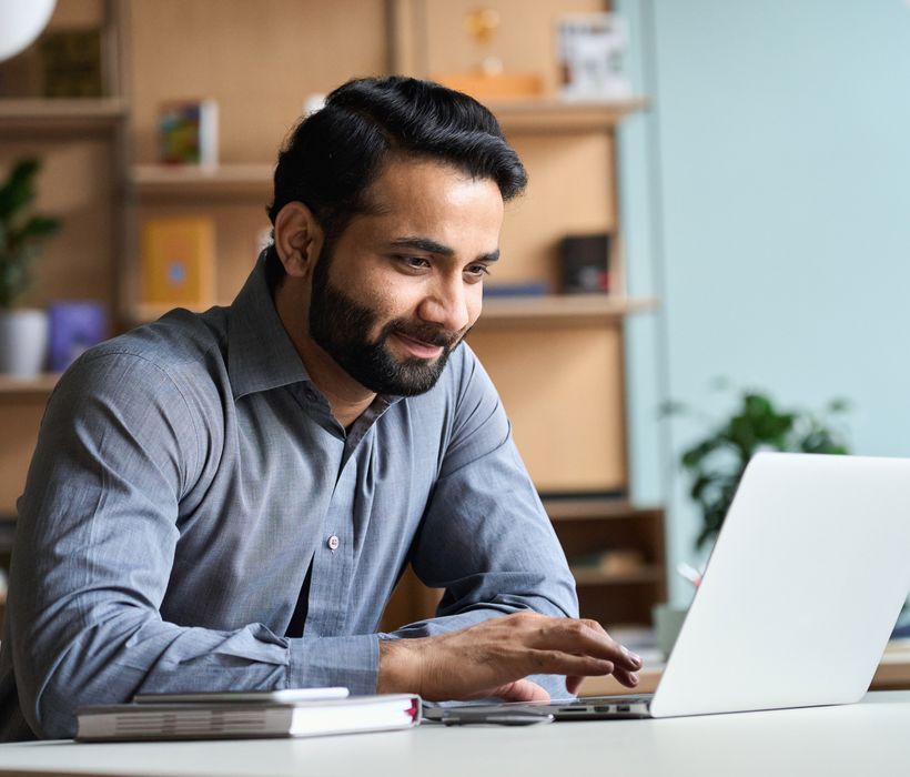 Shutterstock 1940410141man at computer survey