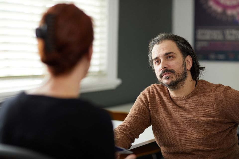 Two people in a consultation